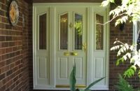 upvc panelled white front door and sidelights
