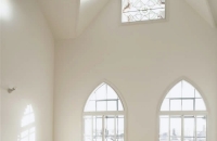 Secondary glazing in arched and curved windows
